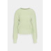 adidas x IVY PARK Plus knitted midi dress in dark green with high neck adidas x IVY PARK Plus knitted midi dress in dark green with high neck